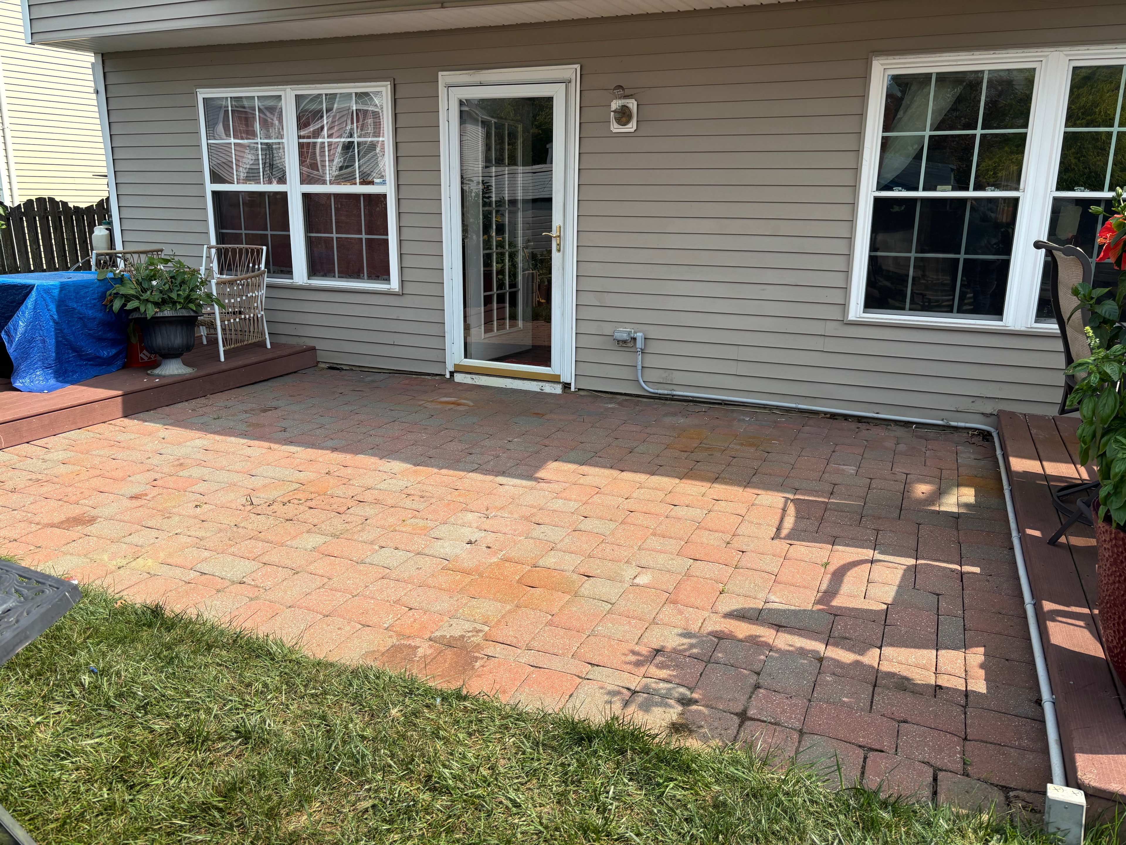 Patio pavers before pressure washing
