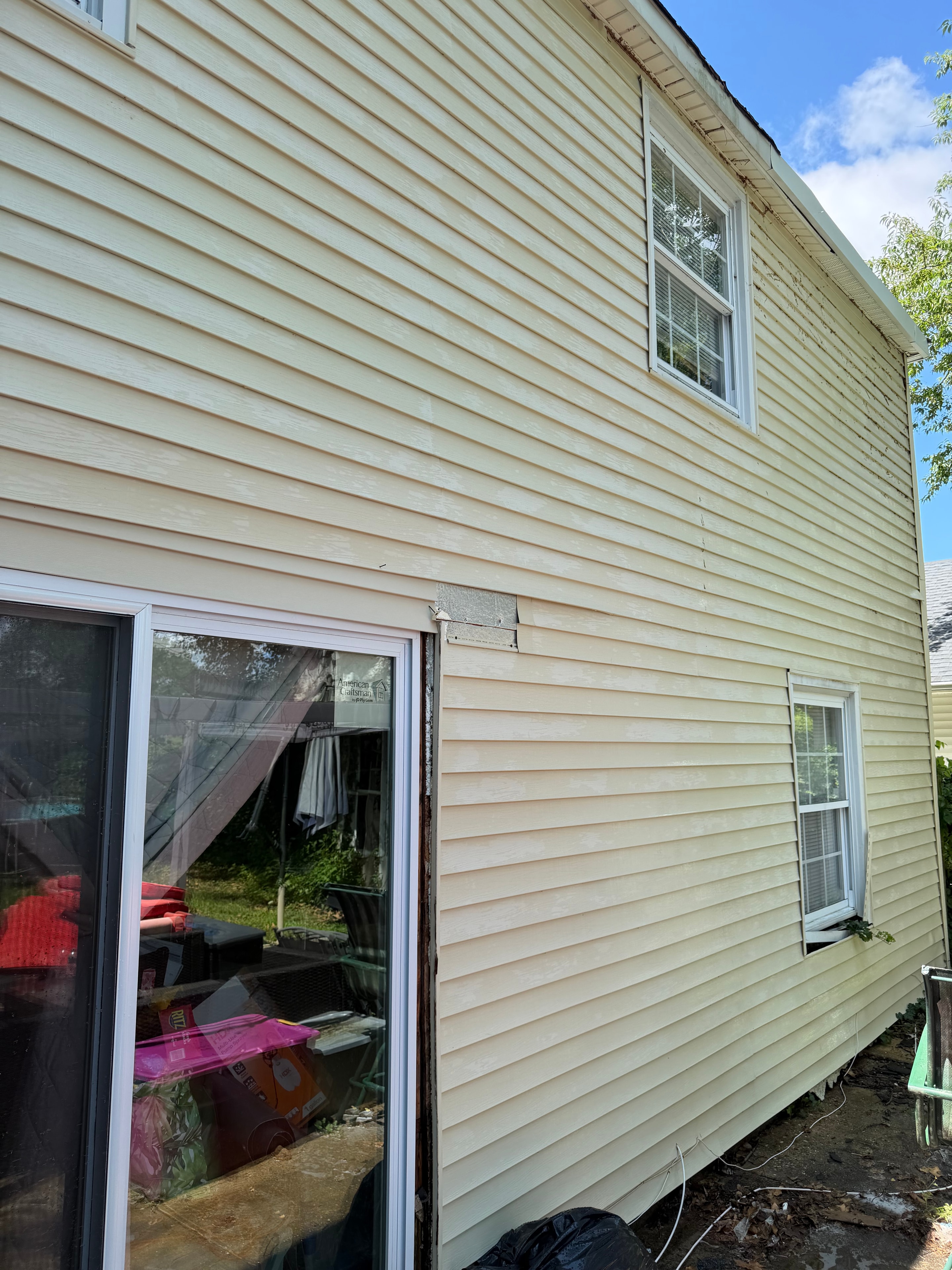 Clean house siding after soft washing