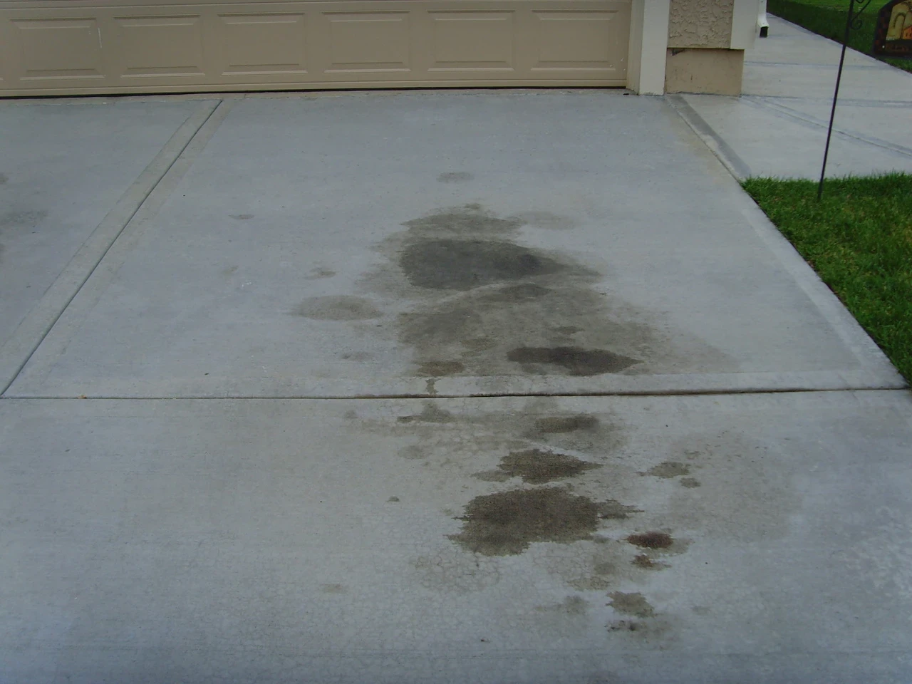 Oil stain removal from concrete driveway